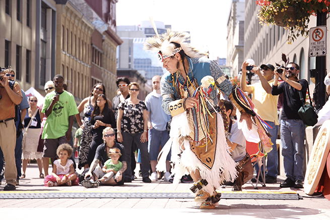 Al Harrington performs during the Peoples' Pow-Wow, held on Sparks St., near the main forum.
